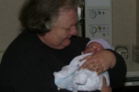 _IGP0484 My mom holding her first gandchild